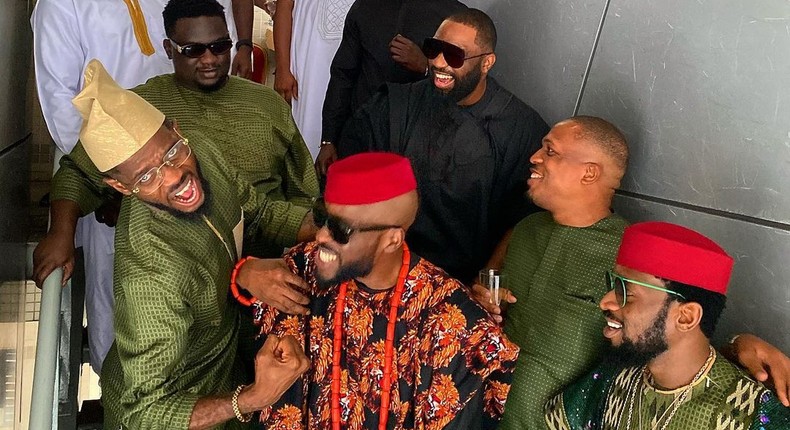 Ikechukwu flanked by his celebrity friends on his wedding [Instagram/OfficialPraiz]