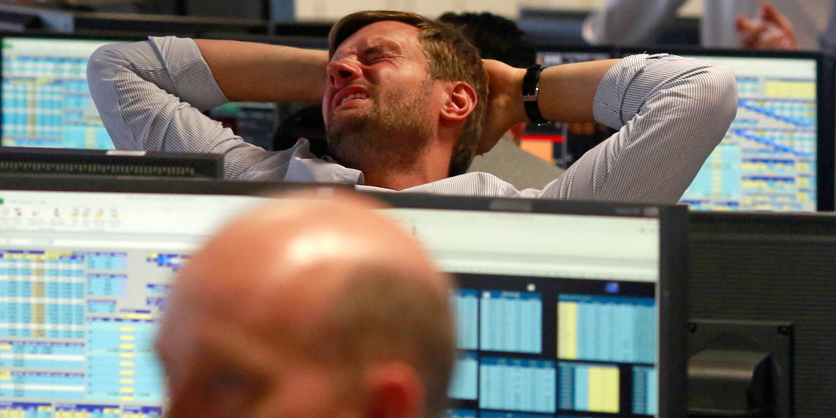 A trader from BGC, a global brokerage company in London's Canary Wharf financial center, reacting Friday after learning that Britain voted to leave the European Union in the so-called Brexit referendum.