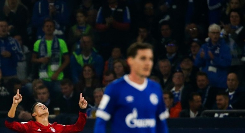 Colombia midfielder James Rodriguez (L) celebrates scoring for Bayern Munich in their 2-0 win over Schalke on Saturday at Gelsenkirchen's Veltins Arena.