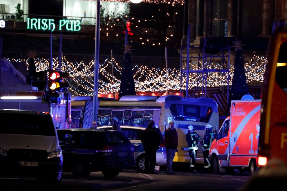 Police stand near the Christmas market in Berlin, Germany, December 19, 2016.