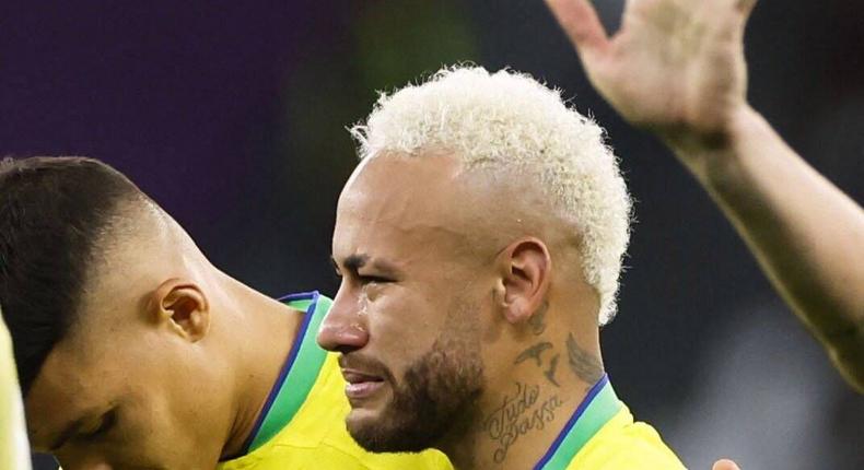 Neymar (front) cries after Brazil lost to Croatia on penalties in a World Cup quarterfinal football match at Education City Stadium on December 9, 2022.