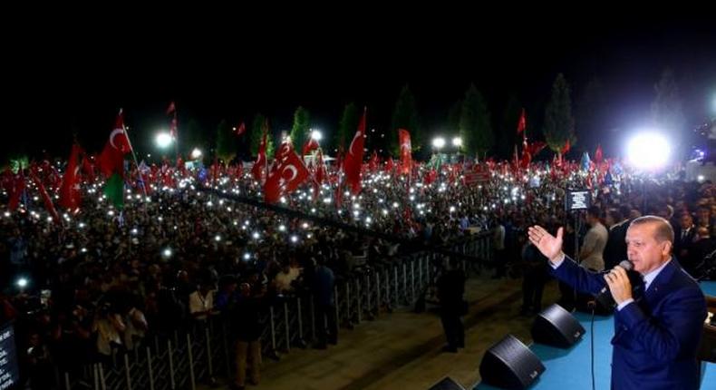Turkey's President Tayyip Erdogan addresses his supporters in front of the Presidential Palace in Ankara, Turkey, August 10, 2016.