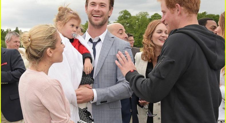 Chris Hemsworth, daughter, wife greet Prince Harry in London