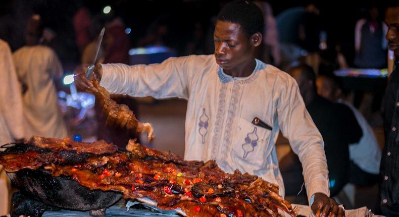 Suya is typically served with sliced onions and tomatoes [Within Nigeria]