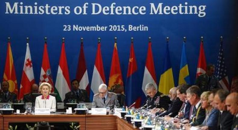 German Defence Minister Ursula von der Leyen (L) opens the Ministers of Defence Meeting at the Julius Leber barracks in Berlin, Germany, November 23, 2015.