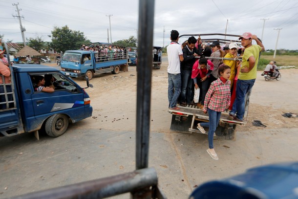 The Wider Image: Cambodian shoe maker has little time for politics