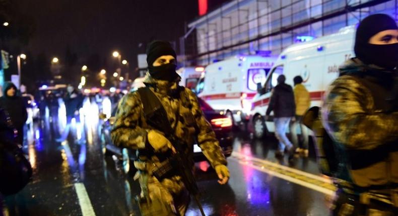 Turkish special force police officers and ambulances are seen at the site of an armed attack at the Reina nightclub in Istanbul on January 1, 2017