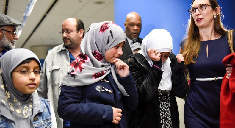 Eman Ali, 12, of Yemen, is reunited with her family as she arrives at the San Francisco airport earlier this year.