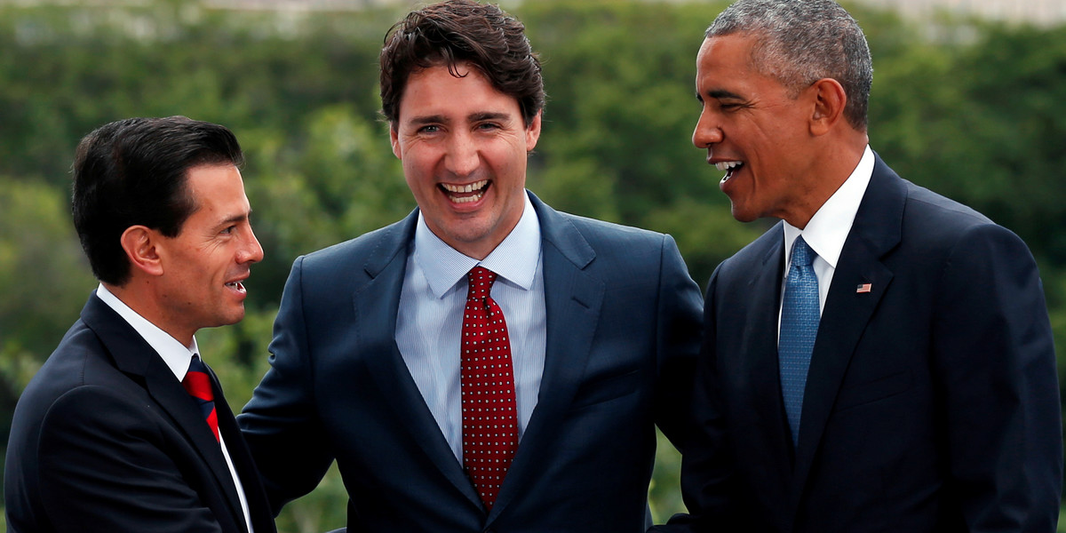Mexican President Enrique Peña Nieto, Canadian Prime Minister Justin Trudeau, and US President Barack Obama posing for the family photo at the North American Leaders' Summit in Ottawa, Ontario, in Canada.