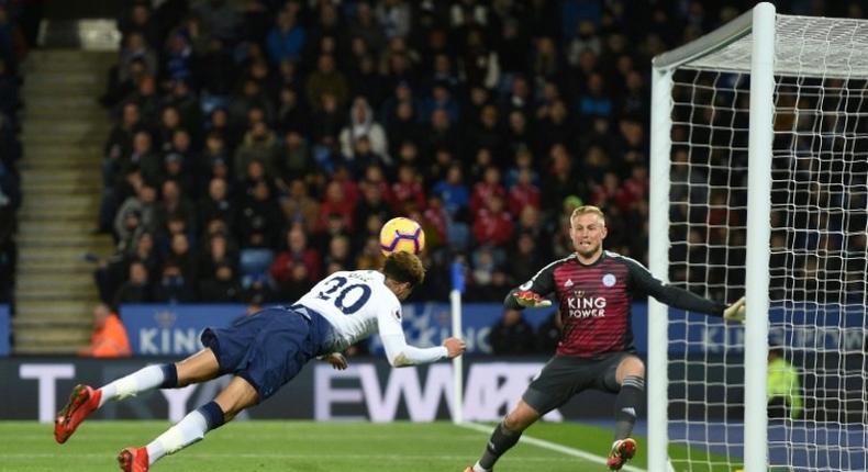 Diving Dele: Dele Alli (left) scored Tottenham's second goal with a diving header in a 2-0 win at Leicester