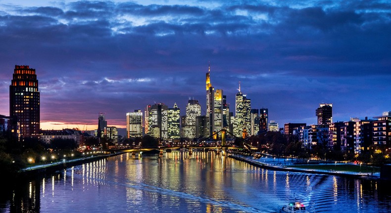 A police boat cruises over the river Main with the buildings of the banking district in background in Frankfurt, Germany, Tuesday, Nov. 19, 2019. (AP Photo/Michael Probst)