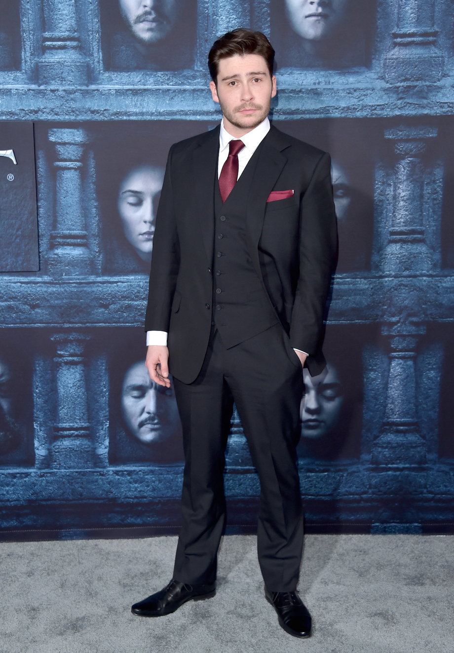 Portman looks sleek in a black suit at the premiere.