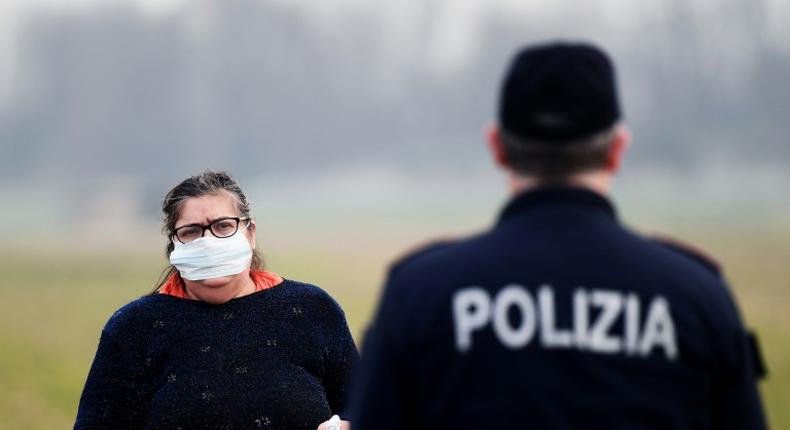 Police setting up checkpoints said they would enforce a blockade which Italy's prime minister warned could last for weeks