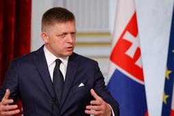 Slovakian Prime Minister Robert Fico gestures as he attends a joint news conference with the French President at the Elysee Palace in Paris