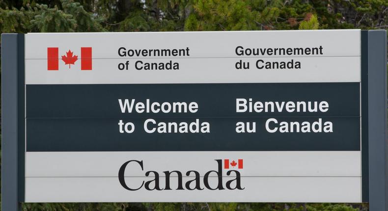 A Welcome to Canada sign at the US-Canada border.
