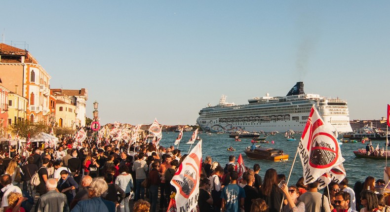 Port cities in Italy, Spain, the Netherlands, French Polynesia, Florida, Alaska, Maine, and California are rethinking their relationships with cruise ships that deliver boatloads of tourists each day.Simone Padovani/Awakening/Getty Images