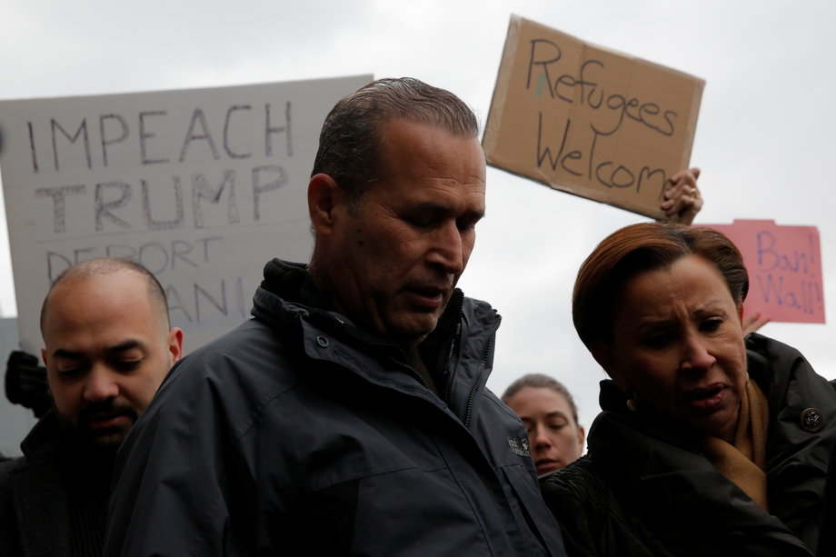 Iraqi immigrant Hameed Darwish stands with Congresswoman Nydia Velazquez (R) after being released at John F. Kennedy International Airport in Queens, New York, U.S., January 28, 2017.