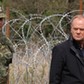 Premier Donald Tusk przy granicy z Białorusią w miejscowości Ozierany Wielkie, maj 2024 r.