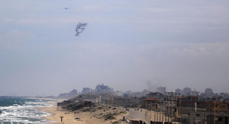 Planes drop humanitarian aid in Gaza City on March 25, 2024.Yasser Qudaih/Anadolu via Getty Images