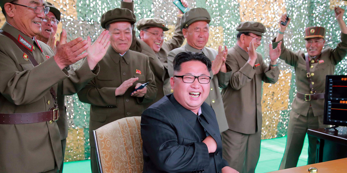 North Korean leader Kim Jong Un reacts during a test launch of ground-to-ground medium long-range ballistic rocket Hwasong-10 in this undated photo released by North Korea's Korean Central News Agency (KCNA) on June 23, 2016.