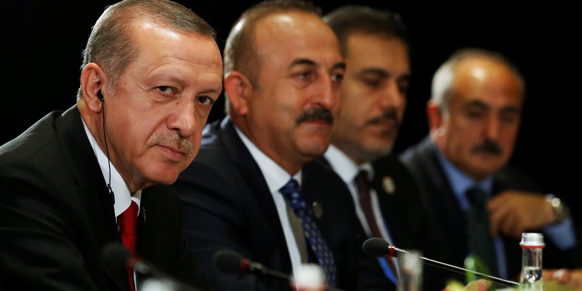 Turkish President Recep Tayyip Erdogan, left, listening to remarks by US President Barack Obama after a bilateral meeting alongside the G-20 Summit, in Hangzhou, China, on September 4.