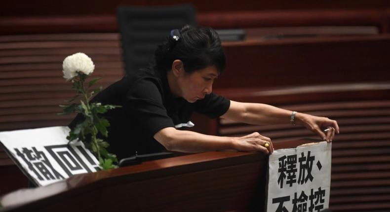 In a tense session, Hong Kong opposition lawmakers criticised the government's handling of the political crisis