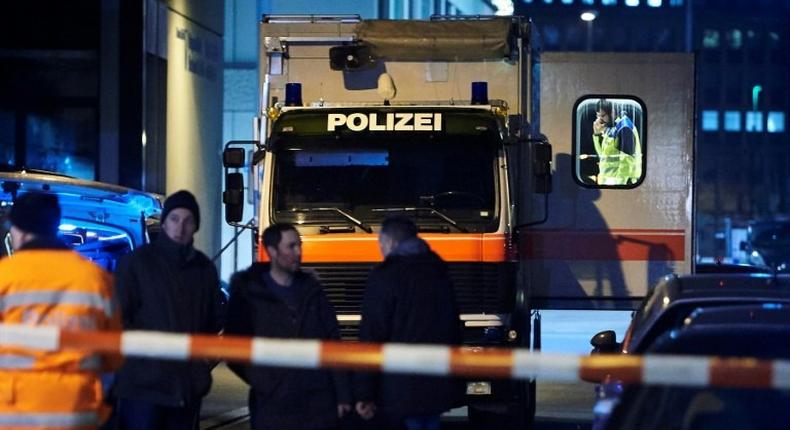 A police vehicle is parked outside a Muslim prayer hall in Zurich after a shooting incident on December 19, 2016