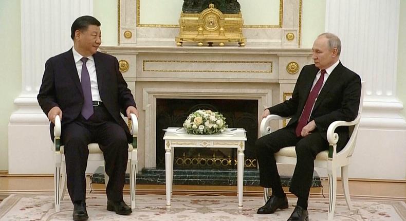 China's Xi Jinping and Russia's Vladimir Putin together in Moscow on March 20, 2023.Russian pool via AP
