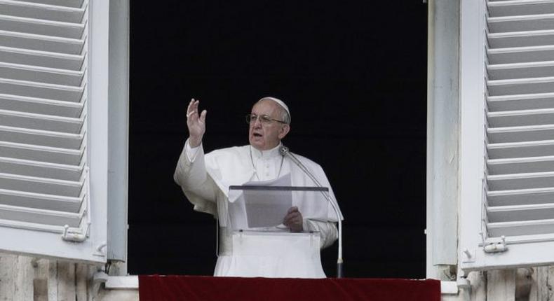 Pope Francis says he may consider making married men priests