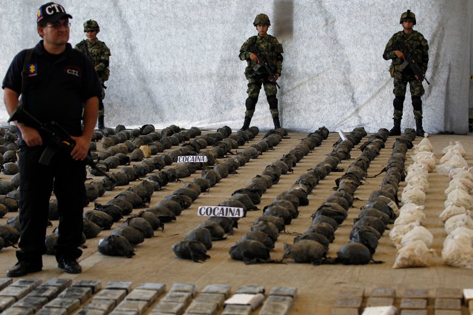 Colombian army anti-drug personnel and a member of the CTI guard seized cocaine seized at a military base in Tumaco, March 16, 2013.