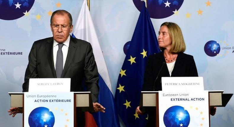 Russian Foreign Affairs Minister Sergei Lavrov (L) and EU diplomatic chief Federica Mogherini give a joint press conference in Brussels on July 11, 2017