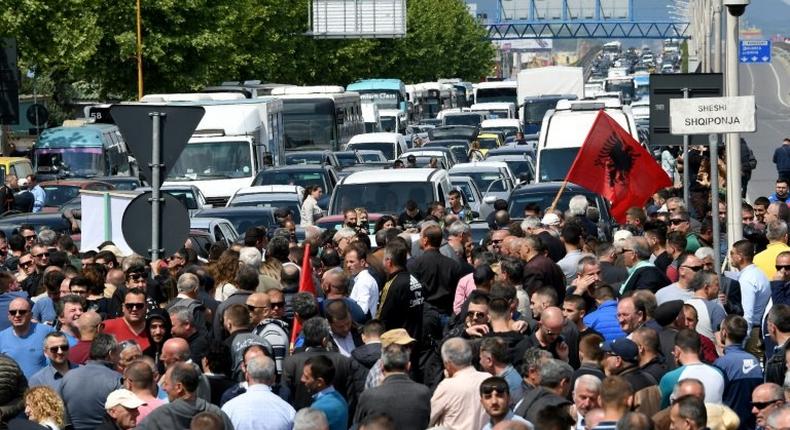 Supporters of the Albanian opposition block roads to demand the prime minister's resignation