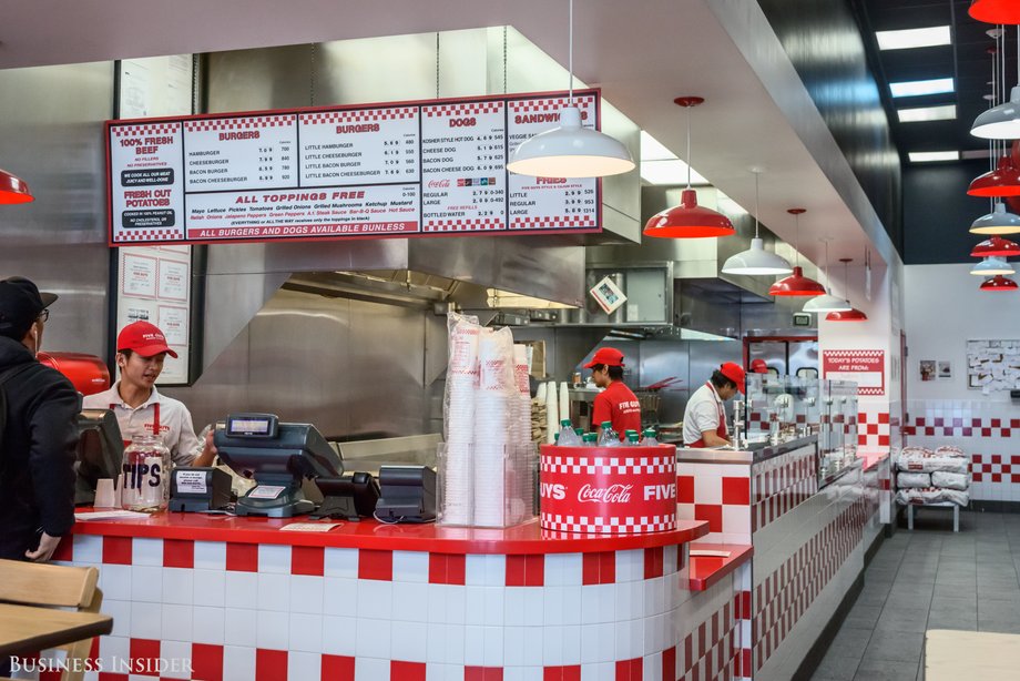 The design of Five Guys restaurants in decidedly different than most better-burger chains. Gone are the warm wood accents, brushed nickel, and dim light ...