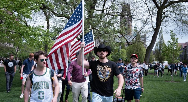 Pro Israeli activists prepare to confront people at a pro-Palestinian encampment protesting the war in Gaza on the campus of the University of Chicago on May 03, 2024.Scott Olson/Getty Images