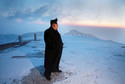 North Korean leader Kim Jong Un views the dawn from the summit of Mt Paektu