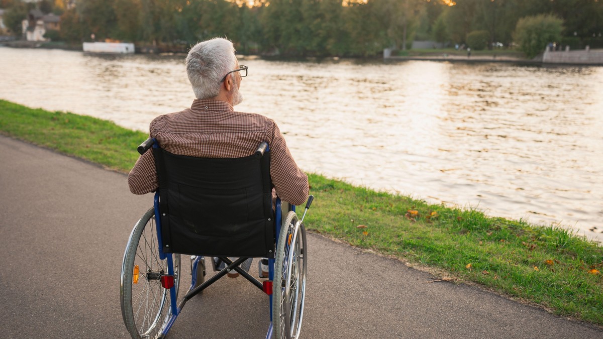 Muškarac u kolicima - ilustracija