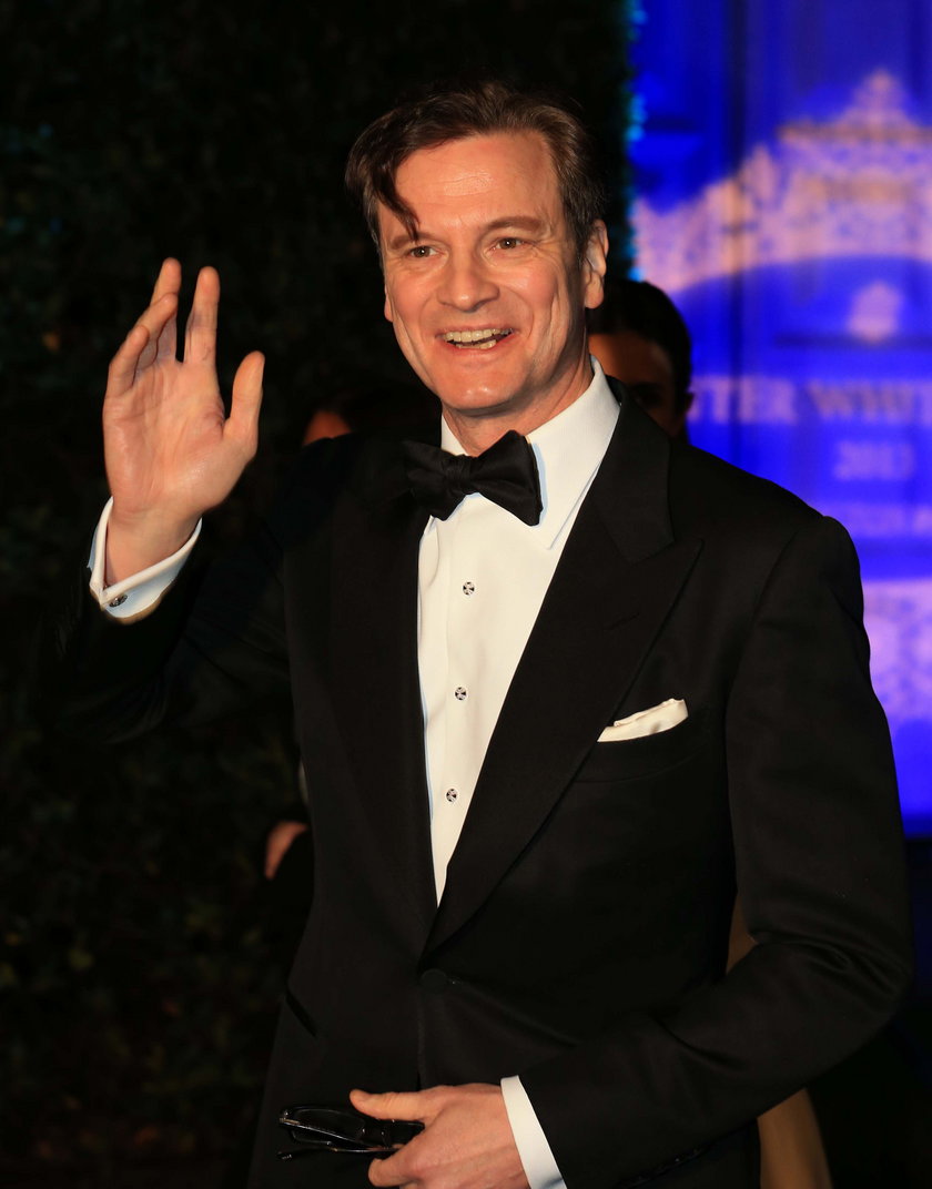 Colin Firth na Winter Whites Gala w palacu Kensington w Londynie