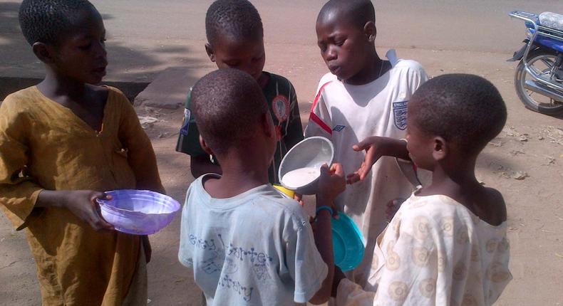Almajiri children sharing food in the North 