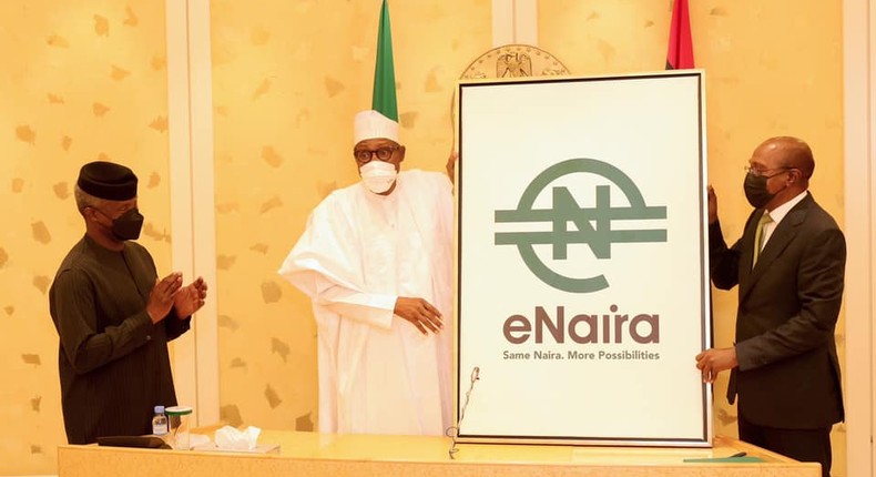 L-R: Vice President Yemi Osinbajo; President Muhammadu Buhari; and CBN Governor, Godwin Emefiele at the launch of eNaira [Presidency]