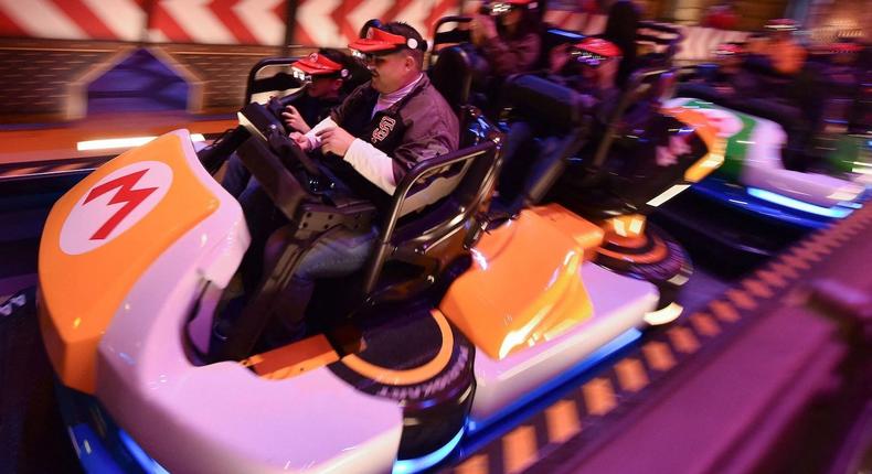 Guests ride Super Mario Kart during a preview of Super Nintendo World at Universal Studios in Los Angeles on January 13.Chris Delmas/AFP via Getty Images