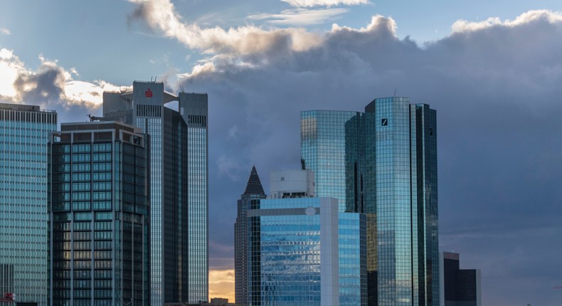 Office buildings, including the corporate headquarters of Deutsche Bank, stand in the financial district in the city center of Frankfurt, Germany.