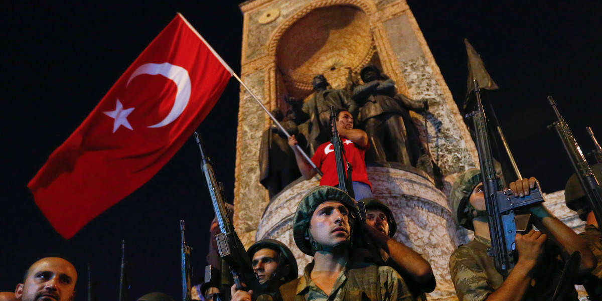People demonstrate in front of the Republic Monument at Taksim Square in Istanbul, Turkey, on July 16.