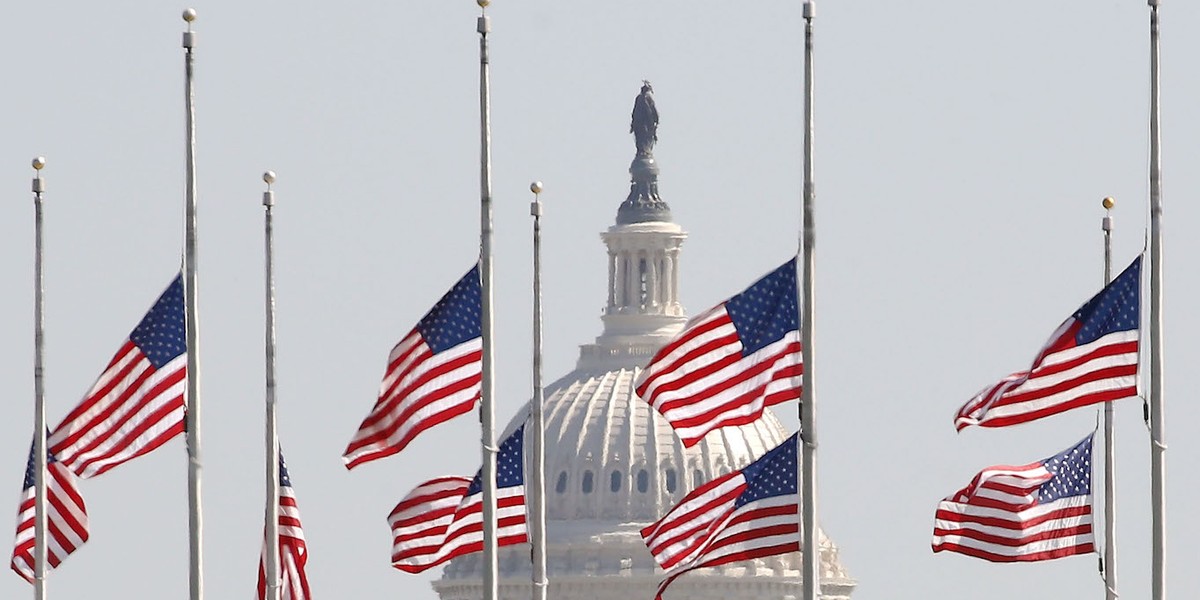 U.S. flags on the grounds of the Washington Monument are lowered to half-staff, on October 2, 2017 in Washington, DC. President Donald Trump ordered the flags on all federal buildings to fly at half-staff following the mass shooting that left more than 50 dead in Las Vegas.