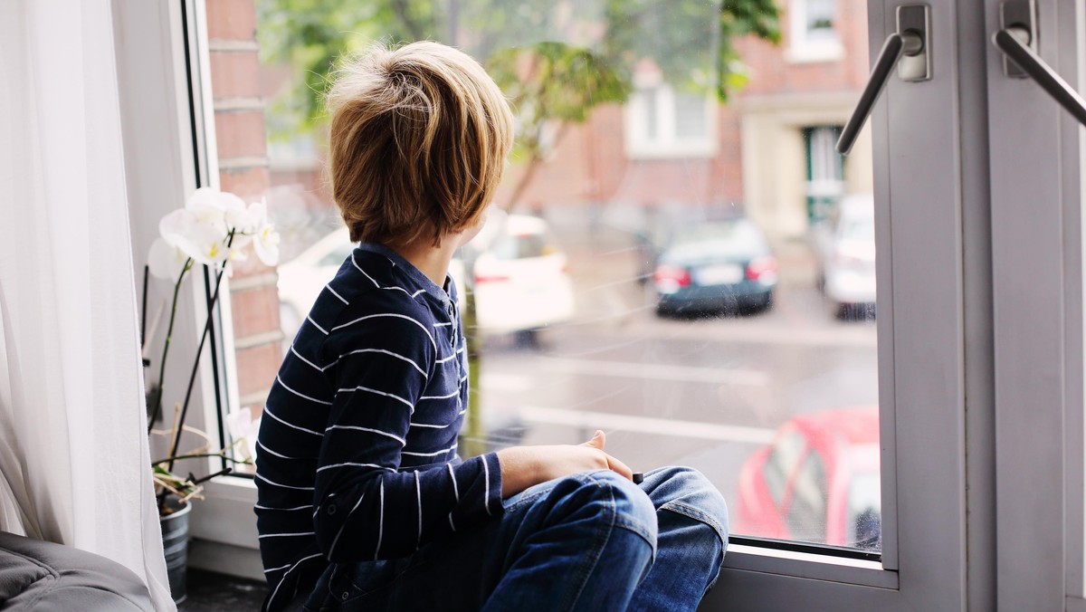 7 year old boy playing tablet