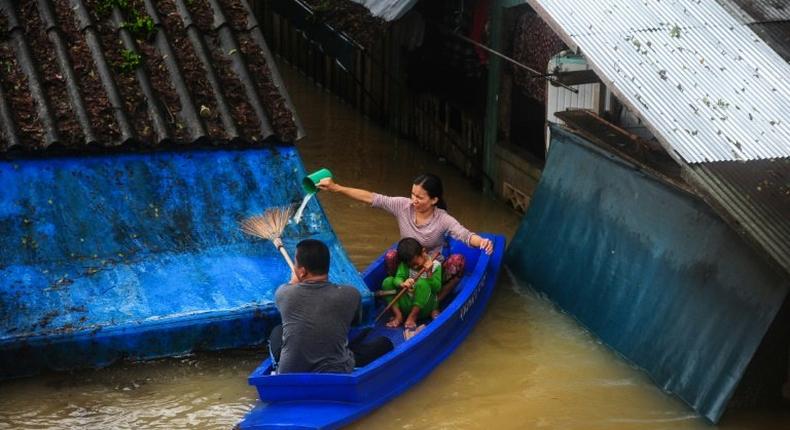 At least 12 people have died in Thailand as heavy rains continue to batter the flood-ravaged south with water roof-high in some areas