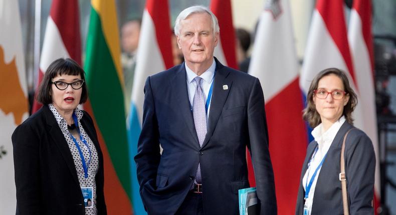 European Chief Negotiator for the United Kingdom Exiting the European Union Michel Barnier (C) flanked by the EU deputy chief negotiator for Brexit Sabine Weyand (L) and the Michel Barnier Director Strategy, Coordination, Communication @MichelBarnier @EU_Commission; Negotiations with the #UK Stephanie Riso (R) arrive ahead of a European Council meeting on Brexit at The Europa Building, the European Council on April 10, 2019 in Brussels, Belgium.