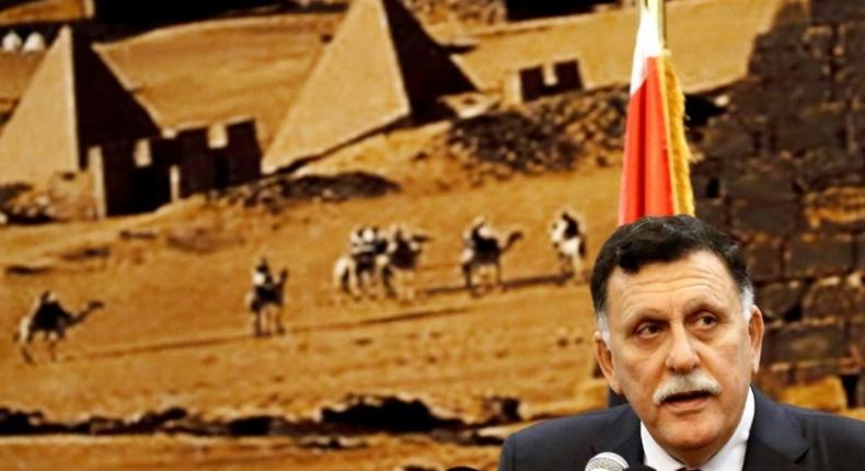 Libya's unity government chief Fayez al-Sarraj at a joint press conference in the Sudanese capital on August 27, 2017