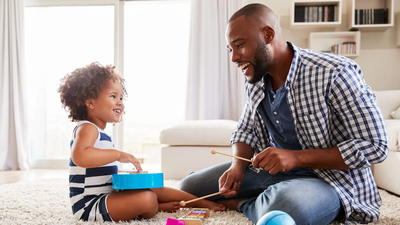 A father and daughter having fun together