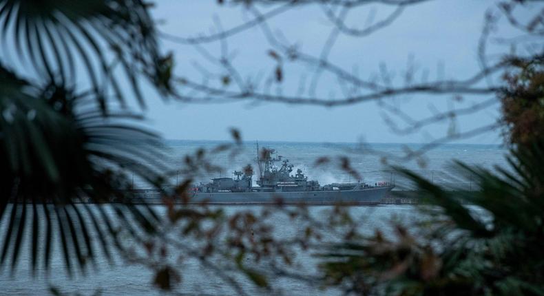 A warship is seen docked in the port of the Black Sea resort city of Sochi during a storm on Nov. 27, 2023.Photo by MIKHAIL MORDASOV/AFP via Getty Images