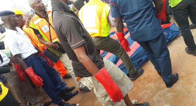 NEMA officials at the scene of a helicopter crash in Oworonshoki, Lagos on August 12, 2015